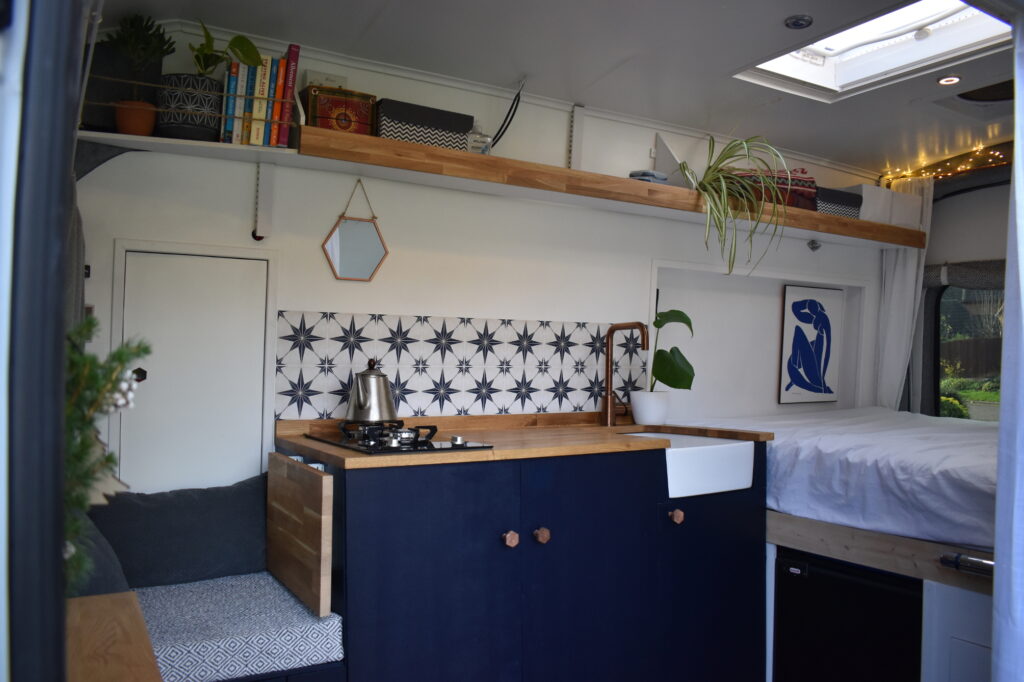 Handmade kitchen with blue cupboards